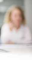 Image: blurred student listening to lecturer